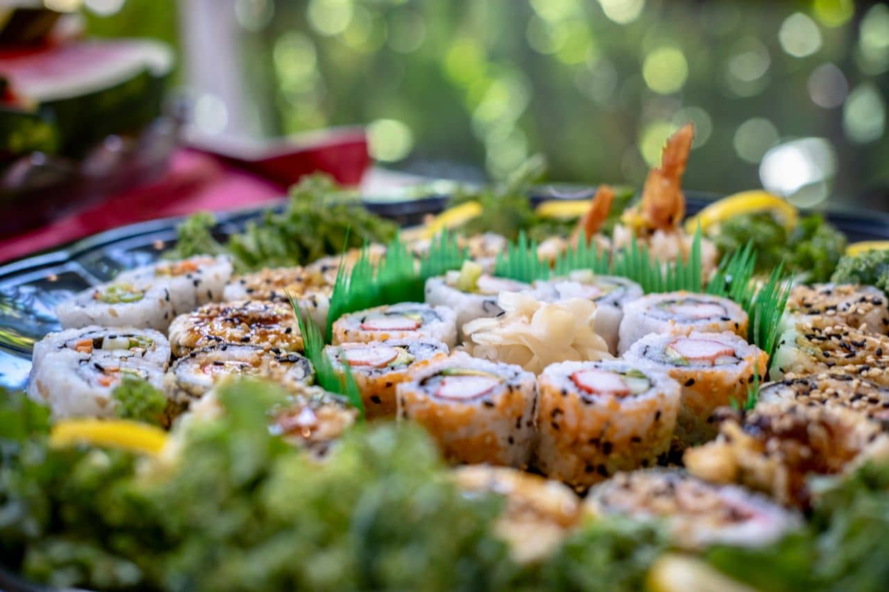fresh sushi rolls prepared for a platter