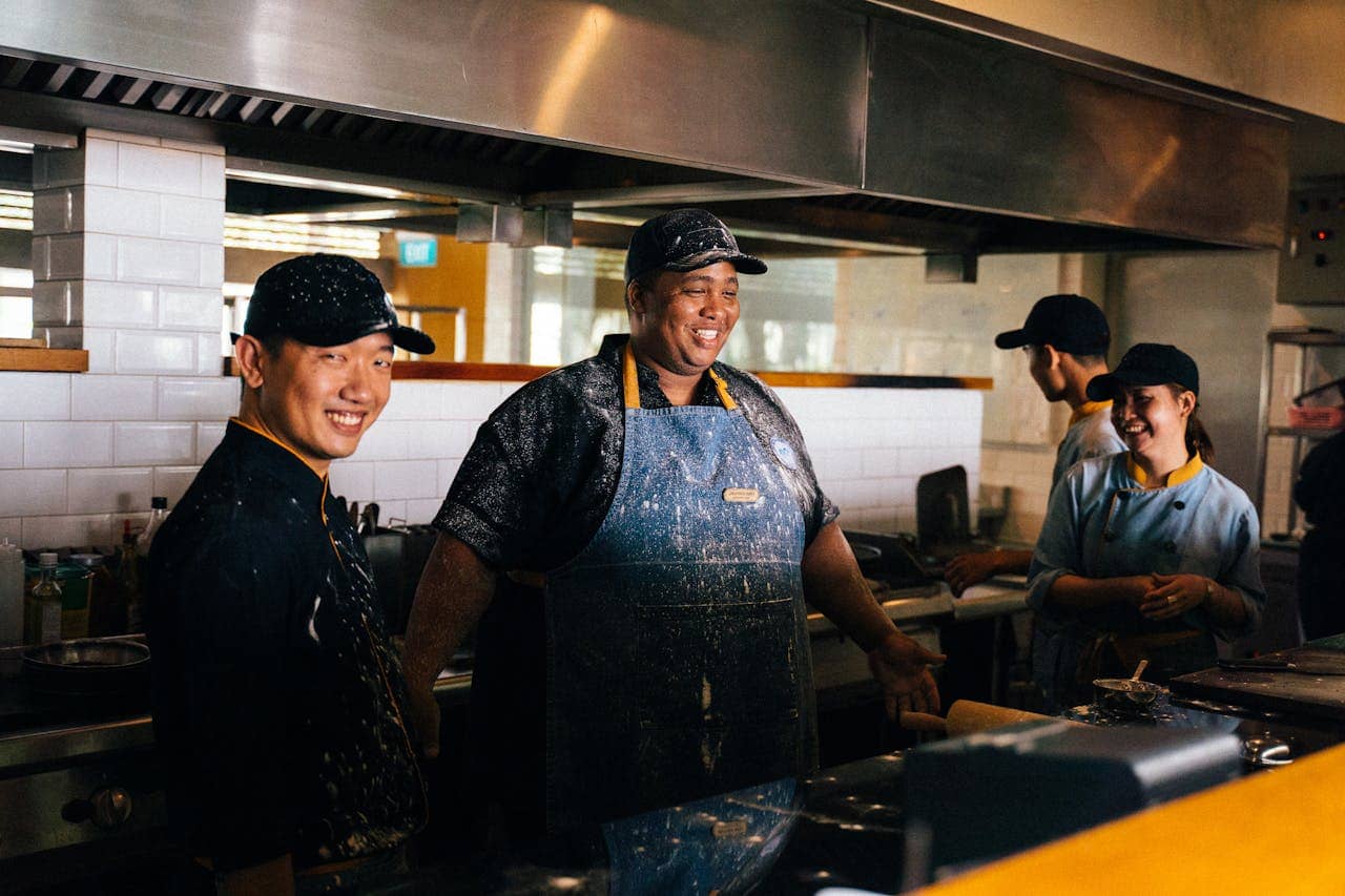 restaurant kitchen team preparing food